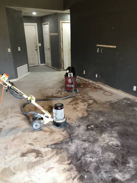 Slab during: grinding the patched floor flat