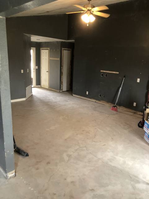 Room after: smooth repaired slab, ready for finish