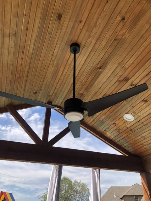 Vaulted wood porch ceiling with new outdoor fan