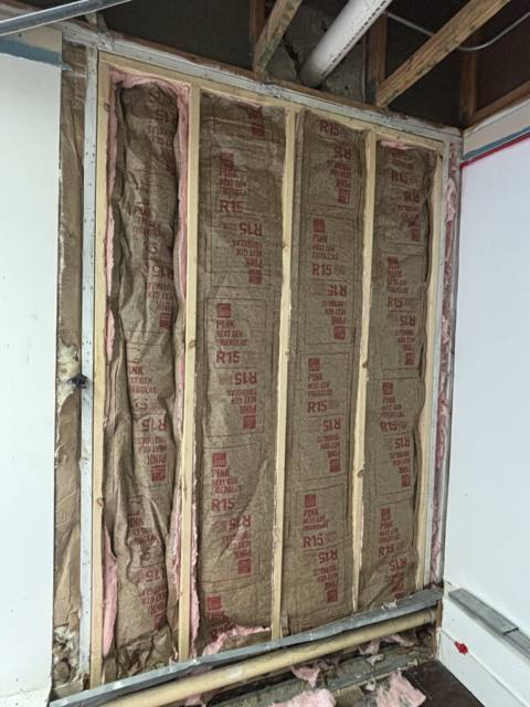 New insulation installed in the open wall