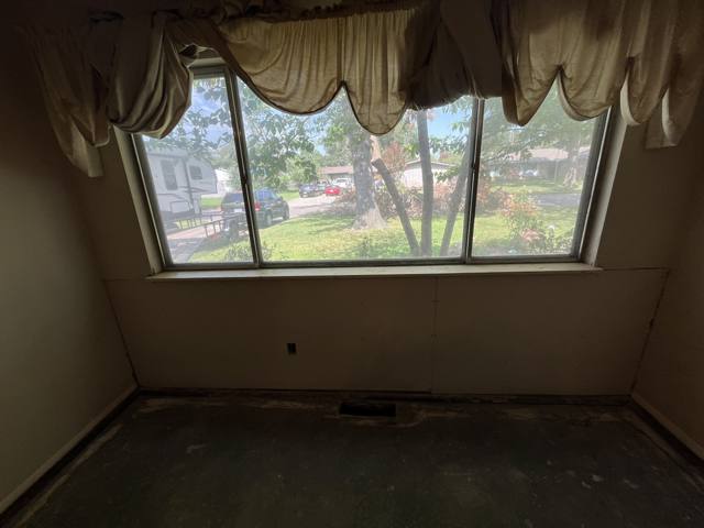 Window wall after: new drywall hung and finished