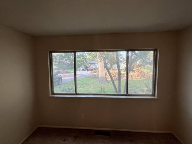 Room after: walls finished and freshly painted